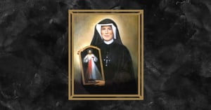 A Framed Picture of Saint Faustina holding the image of Divine Mercy.