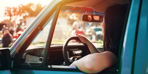 Woman driving a car. 