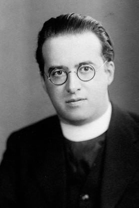 studio portrait of Fr. Georges Lemaître.