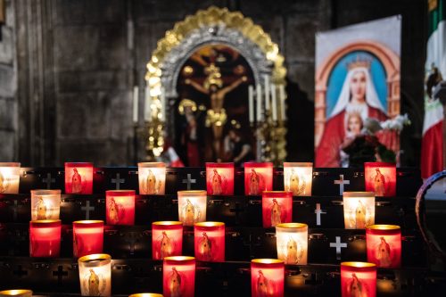 altar with candlelights and image of the blessed virgin mary