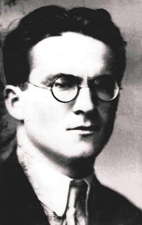 Portrait of a young Mircea Eliade in black and white.