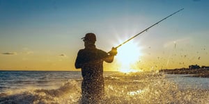 A man being happy while fishing.